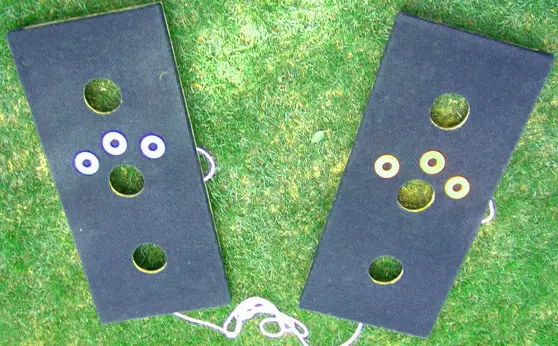 Washer toss three hole board